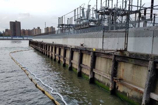 Booms deployed at the Con Ed substation in DUMBO, Brooklyn on Sunday.